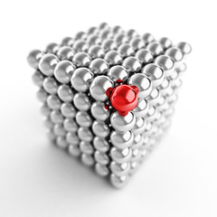 Different element. Cube made from shiny metal balls