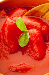 raw san marzano tomatoes with basil