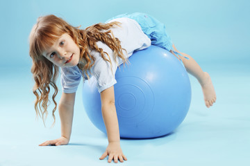 Child with gymnastic ball