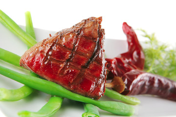 fillet mignon on a white plate