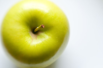 Green apple in a bowl