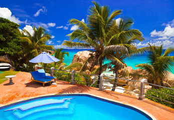 Pool in hotel at tropical beach, Seychelles