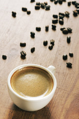 Cup of coffee and beans
