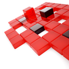 Abstract red and dark glass cubes on a white