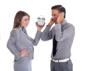 Young Business men and women having fun with alarm clock