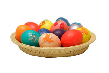 Fototapeta na wymiar Easter eggs in bascket on white background
