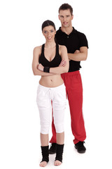 Fototapeta na wymiar Fitness couple posing to camera