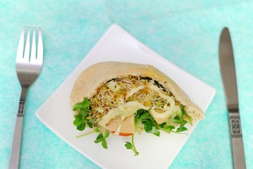 Salad sandwich on plate