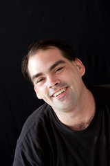 man smiling with dimples