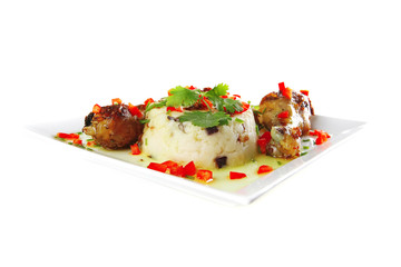 chicken drumsticks served on white