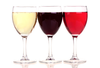 Red, rose and white wine in a wine glasses