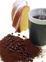 freshly brewed coffee and cake on white background