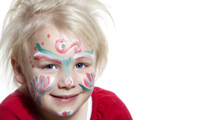 Sweet blond child with painted face