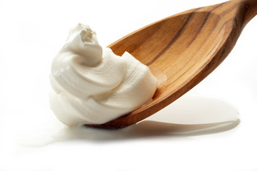 cream sauce over the spoon