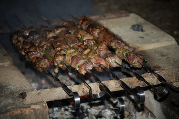 more fresh, juicy meat prepared on charcoals