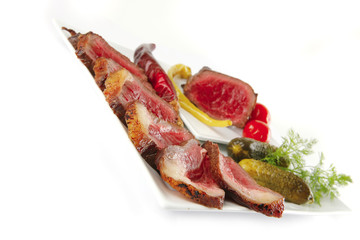Obraz premium meat sliced with tomatoes and peppers