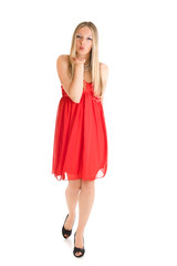 Isolated caucasian blond woman in red dress