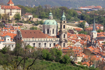 Fototapeta premium The View on spring Prague's St. Nicholas' Cathedral