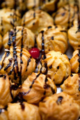 Many yellow cakes in cafe in morning