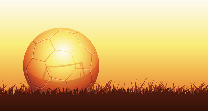 golden soccer ball reflecting goal