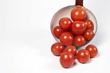 Tomaten und Schöpfkelle