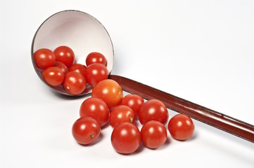 Tomaten und Schöpfkelle