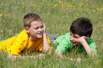 Conversation of two boys outdoors