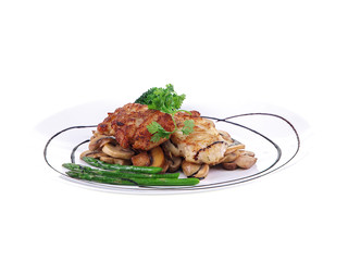 fried fish with vegetables isolated on white background