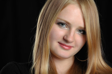 Naklejka premium Portrait of the pretty young girl of the blonde