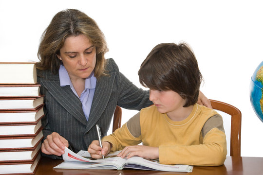 Mother helping her child with the homeworks