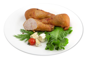 Stuffed chicken legs with garlic, a tomato and greens