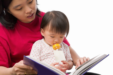 Mother story telling her daughter