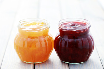 Fototapeta na wymiar strawberry and apricot jam