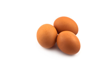 Three brown eggs