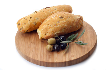 italian olive bread over cutting board