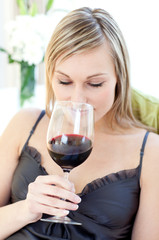 Beautiful woman drinking red wine