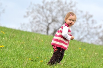 baby in meadow