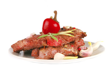 beef meat chunk on grey dish