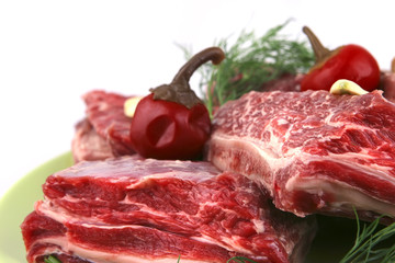 beef rib's on dish with greenery