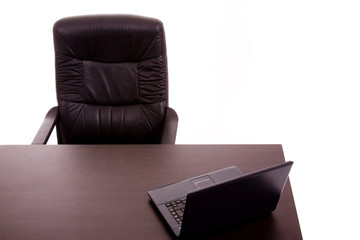 Laptop in a office desk, on white background