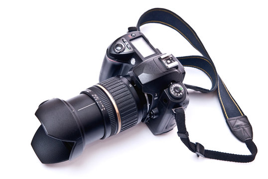 Camera equipped with zoom lens isolated on white