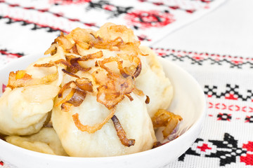 Close-up of Ukrainian dumplings with onion