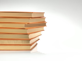 Stack of books in bleed with leather binding and gilt edging