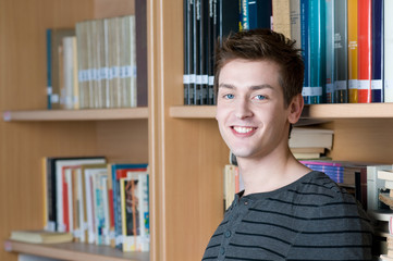 Happy student in a library