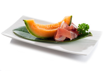 parma ham with melon on dish