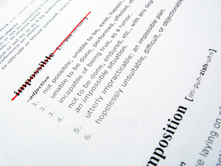 Fototapeta premium Striked out IMPOSSIBLE word on a page of a dictionary