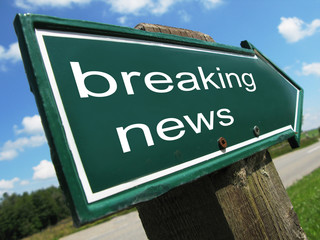 BREAKING NEWS road sign