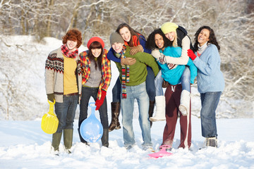 Group Of Teenage Friends Having Fun In Snowy Landscape