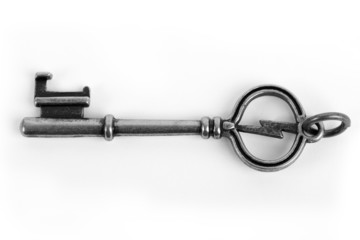 Old vintage key in white background