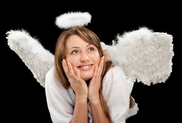 beautiful blonde angel against black background